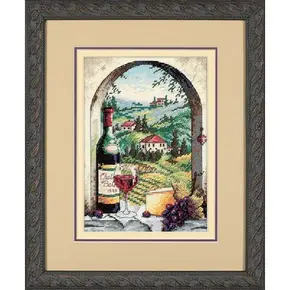 Готова вишита картина хрестиком за набором Dimensions 06972 "Dreaming of Tuscany" (Мріючи про Тоскану). Вид крізь кам'яну арку на залиті сонцем пагорби, кипариси та вілли Італії. На передньому плані підвіконня з пляшкою вина, келихом, сиром та виноградом.